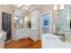 Spacious bathroom with double vanity, granite countertops, and a walk-in glass shower at 2705 Parkers Landing Rd, Mount Pleasant, SC 29466