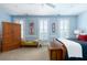 Comfortable bedroom with shuttered windows, wooden accents, and soothing wall colors at 2705 Parkers Landing Rd, Mount Pleasant, SC 29466