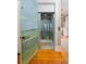Unique elevator featuring a painted door and scenic interior, seamlessly blending with the home's aesthetic at 2705 Parkers Landing Rd, Mount Pleasant, SC 29466