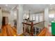 Bright hallway showcases wood floors, columns, and scenic views at 2705 Parkers Landing Rd, Mount Pleasant, SC 29466