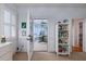Cozy room showcasing a doorway view, filled with natural light and neutral decor at 2705 Parkers Landing Rd, Mount Pleasant, SC 29466
