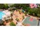 Aerial view of a community playground featuring multiple play structures, a basketball court and a pool with a covered patio at 2705 Parkers Landing Rd, Mount Pleasant, SC 29466