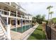 Backyard with a beautiful in-ground swimming pool and an outdoor living area at 2705 Parkers Landing Rd, Mount Pleasant, SC 29466