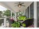 Covered porch with ceiling fans and comfortable seating at 2705 Parkers Landing Rd, Mount Pleasant, SC 29466