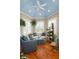 Inviting sunroom with a vaulted ceiling, many windows, and charming furniture, perfect for relaxation and enjoying natural light at 2705 Parkers Landing Rd, Mount Pleasant, SC 29466