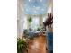 Inviting sunroom with a vaulted ceiling, many windows, and charming furniture, perfect for relaxation and enjoying natural light at 2705 Parkers Landing Rd, Mount Pleasant, SC 29466