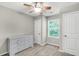 Empty bedroom with closet and natural light from the window at 271 Jackson St, Goose Creek, SC 29445