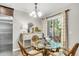 Dining area with glass table and sliding glass doors to the exterior at 271 Jackson St, Goose Creek, SC 29445