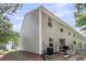 The home's exterior features neutral siding, well-placed windows, and a patio, enhancing its curb appeal at 271 Jackson St, Goose Creek, SC 29445