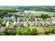Stunning aerial view of the community located on a serene lake with beautiful homes at 2746 Sunrose Ln, Johns Island, SC 29455