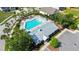 Cool off in the community pool surrounded by palm trees, lounge chairs, and a pool house at 2746 Sunrose Ln, Johns Island, SC 29455