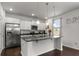 Bright kitchen with white cabinets, stainless steel appliances, and granite countertops at 2746 Sunrose Ln, Johns Island, SC 29455