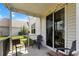 Cozy screened patio with comfortable seating, perfect for outdoor relaxation at 2746 Sunrose Ln, Johns Island, SC 29455