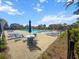 Community pool area with ample seating, umbrellas, and sunny relaxation spots at 2746 Sunrose Ln, Johns Island, SC 29455