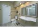 Bright bathroom features a floating sink, and wood look tile flooring at 3031 Ellington Dr, Summerville, SC 29485