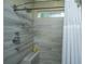 Shower with wood tile surround at 3031 Ellington Dr, Summerville, SC 29485