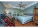 Relaxing bedroom featuring a trey ceiling, wood floors, and ample natural light at 3031 Ellington Dr, Summerville, SC 29485