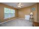 Cozy bedroom with a window providing natural light, neutral carpet, and light brown walls at 3031 Ellington Dr, Summerville, SC 29485