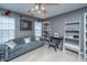 Comfortable bonus room with a couch, desk, and built-in bookshelves at 3031 Ellington Dr, Summerville, SC 29485