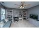 Comfortable bonus room with a couch, desk, and built-in bookshelves at 3031 Ellington Dr, Summerville, SC 29485