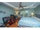 Light-filled bedroom with a trey ceiling and wood floors at 3031 Ellington Dr, Summerville, SC 29485