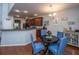 Dining area next to the kitchen with seating for four, stylish decor, and natural light at 3031 Ellington Dr, Summerville, SC 29485