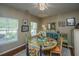 Charming dining room with hardwood floors, decorative table and lots of natural light at 3031 Ellington Dr, Summerville, SC 29485