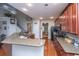 Kitchen featuring granite countertops, stainless steel appliances, hardwood floors, and an open layout at 3031 Ellington Dr, Summerville, SC 29485