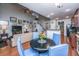 Bright view of living room and dining area featuring an open floor plan, hardwood floors, and recessed lighting at 3031 Ellington Dr, Summerville, SC 29485