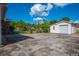 Concrete driveway, shed, and basketball hoop are ready for outdoor fun at 305 Whitewood Ct, Moncks Corner, SC 29461