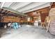Spacious garage with open ceiling, storage, and a large bay at 305 Whitewood Ct, Moncks Corner, SC 29461