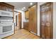 Classic kitchen with wood cabinets, white appliances, and ample storage space at 305 Whitewood Ct, Moncks Corner, SC 29461