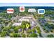 Aerial view showing the house's proximity to N. Main St/ALT-17, CVS, and the Summerville Visitor Center at 318 N Magnolia St, Summerville, SC 29483