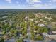 Expansive aerial shot capturing a blend of residential areas and lush greenery at 318 N Magnolia St, Summerville, SC 29483