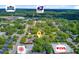 Aerial view highlighting the property's location near Palmetto State Armory, CVS, and other retail stores at 318 N Magnolia St, Summerville, SC 29483
