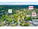 Aerial shot highlighting the home's location near restaurants and other stores at 318 N Magnolia St, Summerville, SC 29483