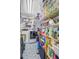 Organized laundry room with washer, dryer, shelving units, and storage solutions for efficient space use at 318 N Magnolia St, Summerville, SC 29483