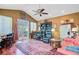 Inviting living room featuring hardwood floors, comfortable seating, and a door leading to an outdoor deck at 318 N Magnolia St, Summerville, SC 29483