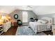 Bedroom featuring a ceiling fan, hardwood floors, rug, and natural light from the window at 34 Dereef Ct, Charleston, SC 29403