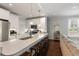 Stylish kitchen with white countertops, stainless steel appliances, and dark hardwood flooring at 34 Dereef Ct, Charleston, SC 29403