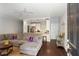 Open-concept living room featuring a comfortable sofa, ceiling fan, and hardwood floors at 34 Dereef Ct, Charleston, SC 29403