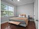 Comfortable bedroom featuring soft lighting, neutral colors, and wood floors at 410 Eliston St, Summerville, SC 29486