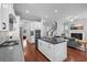 Modern kitchen features a kitchen island, stainless steel appliances, and an open floor plan at 410 Eliston St, Summerville, SC 29486