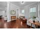 Cozy living room with hardwood floors, and neutral walls with a large window at 410 Eliston St, Summerville, SC 29486