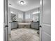 Large bathroom with double sinks, soaking tub, large tile and stand up shower at 410 Eliston St, Summerville, SC 29486