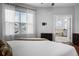 Bright main bedroom with a window and ensuite bathroom at 410 Eliston St, Summerville, SC 29486
