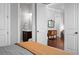 A Primary bedroom showing the ensuite bathroom and a sitting area at 410 Eliston St, Summerville, SC 29486