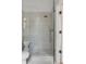This bathroom has a walk-in shower with glass enclosure, modern fixtures, and complementary tile at 507 Mccants Dr, Mount Pleasant, SC 29464