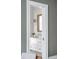Stylish bathroom featuring a white vanity with gold hardware, mirror, and modern lighting at 507 Mccants Dr, Mount Pleasant, SC 29464