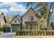 Beautiful brick home with manicured landscaping and a three-car garage at 507 Mccants Dr, Mount Pleasant, SC 29464